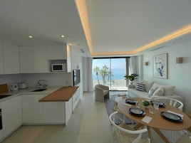 Luxury Apartment, Sea View | Private kitchen | Full-size fridge, microwave, oven, stovetop