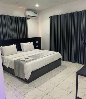1 bedroom, desk, laptop workspace, blackout drapes