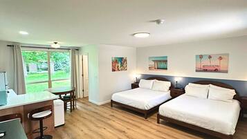 Habitación doble, 2 camas Queen size, cocineta | 2 habitaciones, cortinas blackout y tabla de planchar con plancha