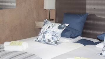 Kamer, 1 twee- of 2 eenpersoonsbedden, uitzicht op tuin | Verduisterende gordijnen, een strijkplank/strijkijzer, gratis wifi