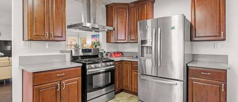 Hus - flere senge - terrasse - udsigt til have (481 Pasadena) | Privat køkken | Kaffe-/temaskine