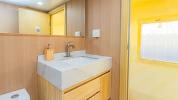Cabin, Multiple Beds, Patio, Garden View (GLAMP 1201 Glendora) | Bathroom | Designer toiletries, towels, toilet paper