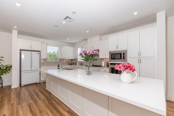 Townhome, 1 Queen Bed, Patio, Garden View (148 A, Irvine) | Private kitchen | Coffee/tea maker - Private Bedroom With Bathroom Central Location (Irvine)