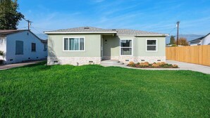 Exterior - Luxury Modern Retreat With Spacious Yard & Premium Comfort (Monrovia)