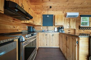Fridge, coffee/tea maker, toaster, cookware/dishes/utensils
