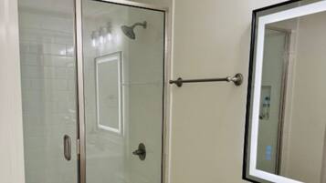 Shower, towels, toilet paper