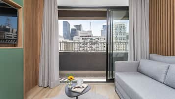 Apartamento superior | Área de estar | Smart TV 40 polegadas com canais digitais