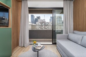 Superior Apartment | Living area - Pivô Pamplona by Viva - Apartamentos novos e espaçosos ao lado da Av Paulista (São Paulo)