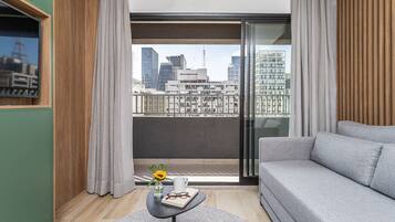 Superior Apartment | Living area | 40-inch Smart TV with digital channels