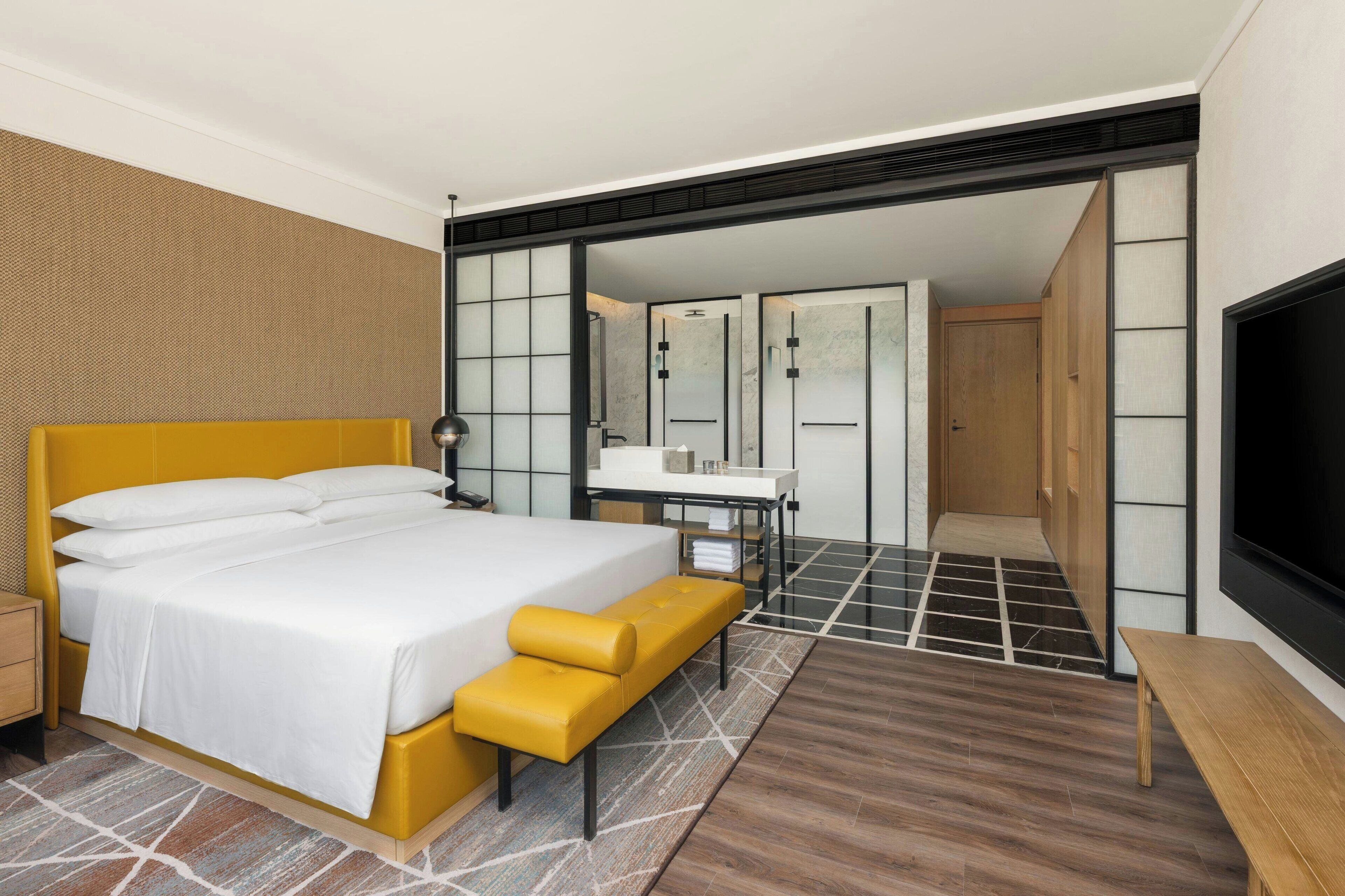 Deluxe Room, 1 King Bed, City View | Premium bedding, down comforters, minibar, in-room safe