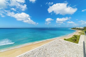 On the beach, sun-loungers, beach towels