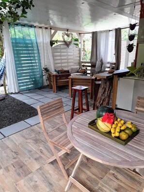 Outdoor dining - Bromeliads at Djo and Rosy's (Sainte-Marie)