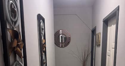 Charming 2-bedroom apartment with AC, WiFi in tranquil Arima