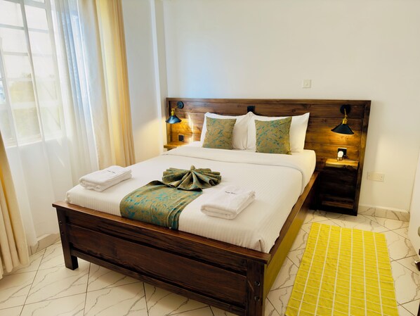 2 habitaciones, tabla de planchar con plancha, wifi y ropa de cama 