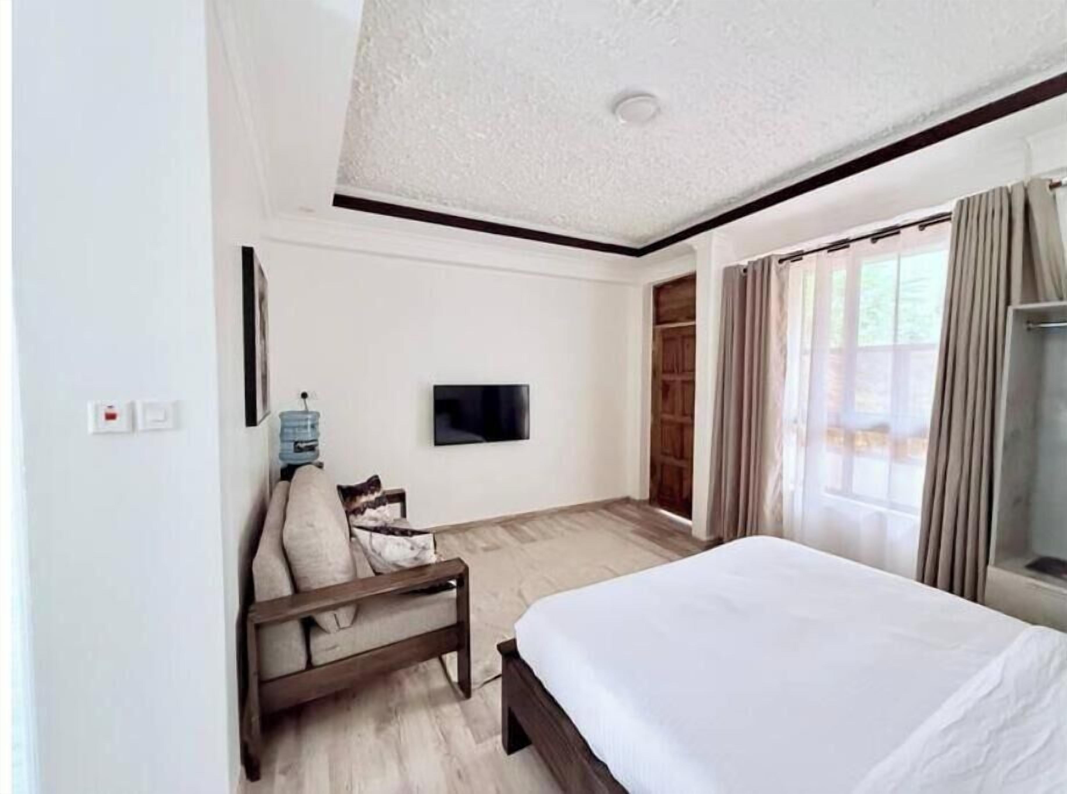 Een strijkplank/strijkijzer, gratis wifi, beddengoed