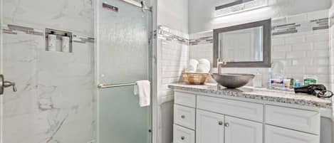 Shower, hair dryer, towels, soap