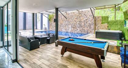 Exquisite 7-Bedroom Mansion in Escazú featuring Heated Pool, Jacuzzi, & Full AC.