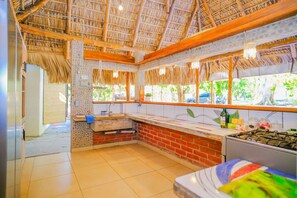 Fridge, microwave, stovetop, coffee/tea maker