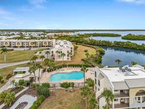 Exterior - Enjoy waterfront living in this 2BR, 2BA condo with balcony + community pool (Fort Myers Beach)