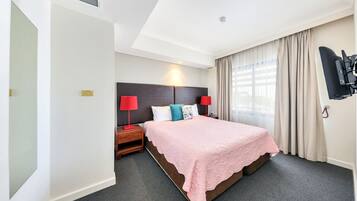 1 bedroom, desk, iron/ironing board, travel cot