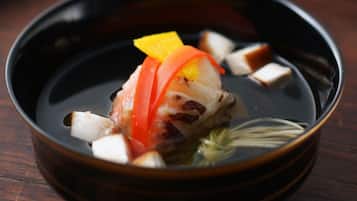 A bowl of food with various ingredients.