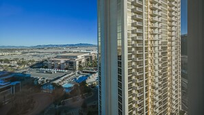 A high-rise building with a modern architectural design, featuring a grid of balconies. - SVS: Strip View Studio | Pool & Gym Included | No Resort Fee | MGM (Las Vegas)