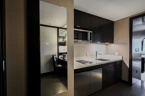 Fridge, microwave, stovetop, coffee/tea maker