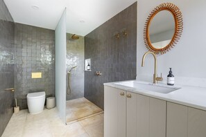 Shower, hair dryer, towels, soap