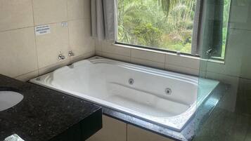 Deluxe Chalet, Lanai | Bathroom | Separate tub and shower, hair dryer, soap, toilet paper