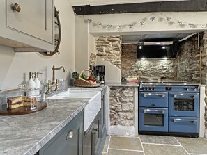 Microwave, oven, dishwasher, dining tables