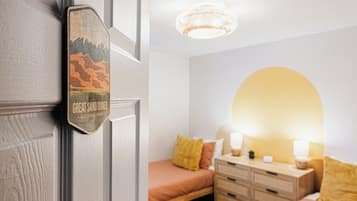 4 bedrooms, desk, iron/ironing board, travel cot