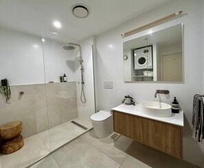 Shower, hair dryer, towels, soap