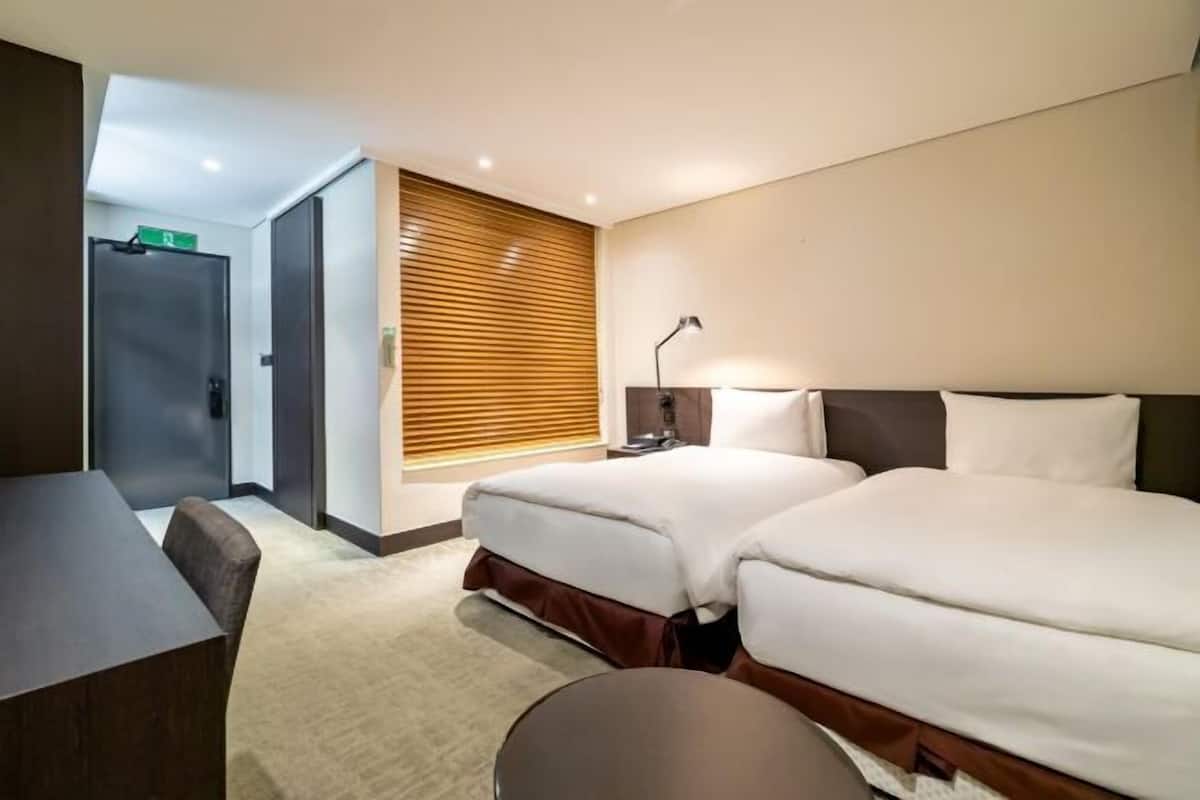 Desk, laptop workspace, free WiFi, bed sheets