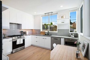 Fridge, microwave, oven, stovetop - Perch - Cozy 2BR home. Walk everywhere, park with ease, and surrounded by coffee shops and dining! (Seattle)