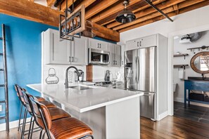 Fridge, microwave, dishwasher, coffee/tea maker