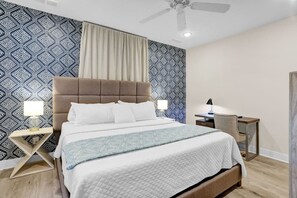 1 bedroom, desk, iron/ironing board, travel crib