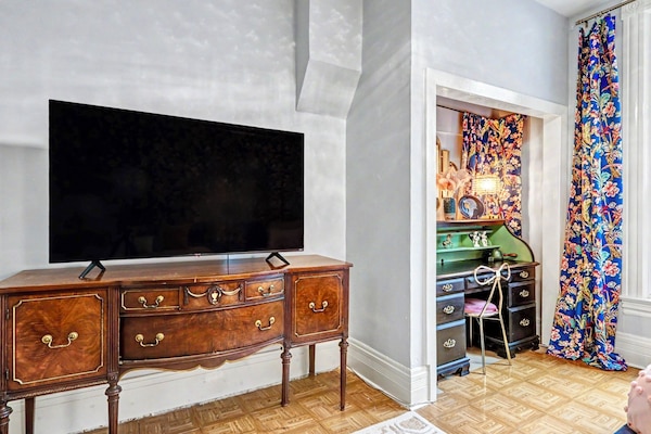 Boutique comfort with Smart TV and curated décor.