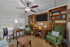 Smart TV, fireplace, books