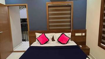 Deluxe Double or Twin Room, City View | Desk, laptop workspace, blackout curtains, free WiFi