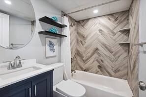 Hair dryer, towels, shampoo