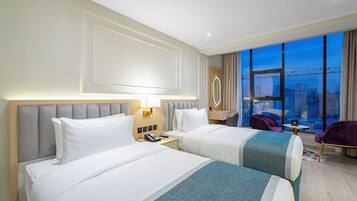 Kahden hengen executive-huone (kaksi sänkyä), 2 yhden hengen sänkyä, kaupunkinäköala | 1 makuuhuone, tallelokero huoneessa, työpöytä