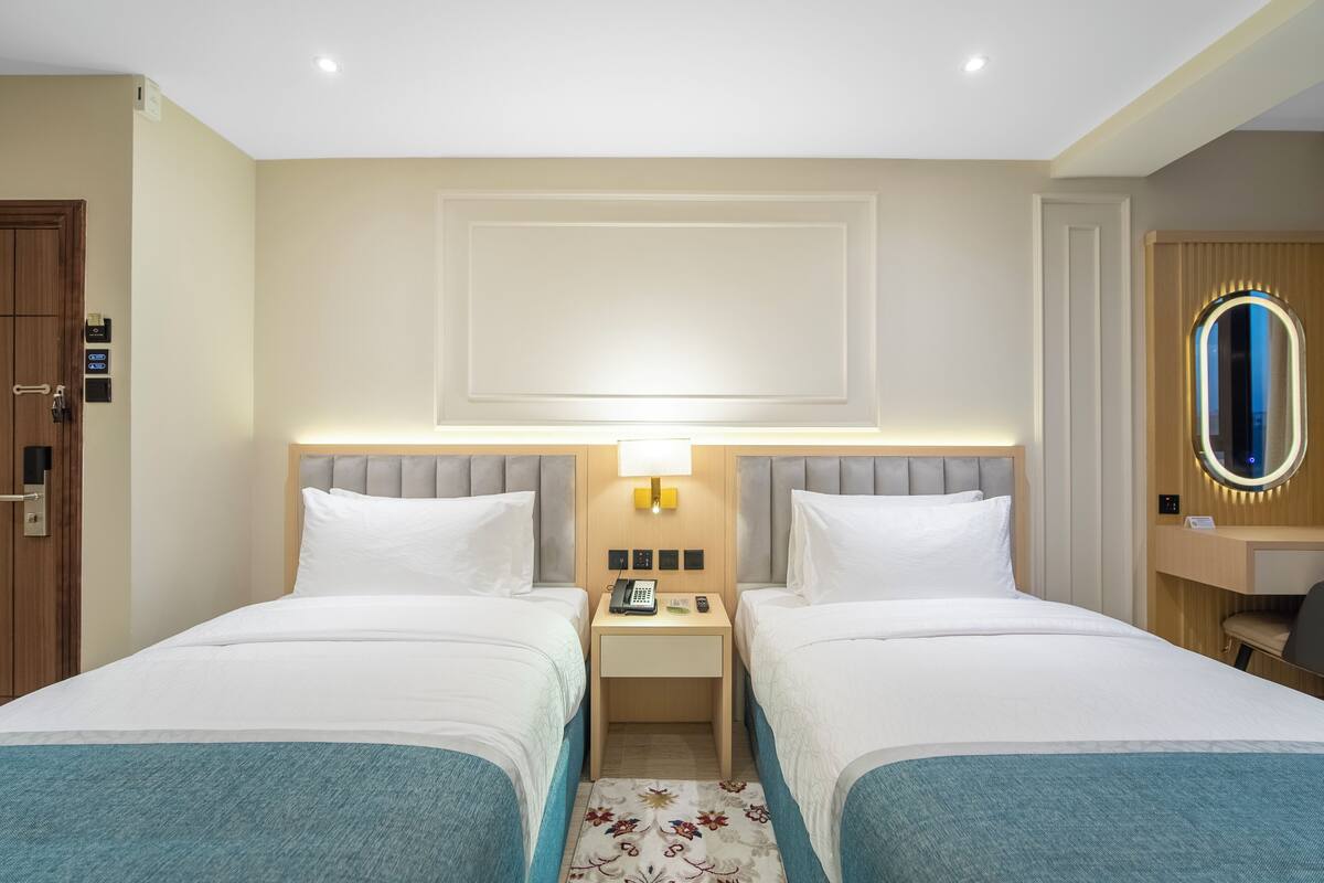 Executive Twin Room, 2 Twin Beds, City View | Minibar, in-room safe, desk, laptop workspace