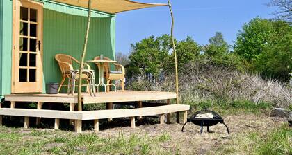 Bee wagon with fireplace & sauna can be used all year round in the natural garden
