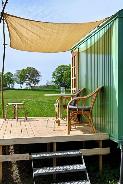 Bee wagon with fireplace & sauna can be used all year round in the natural garden