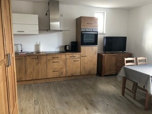 Fridge, coffee/tea maker, cookware/dishes/utensils
