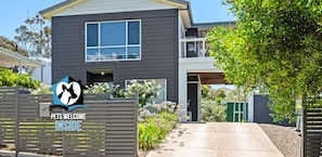 A modern two-story house with a gated entrance, a visible mailbox, and a well-maintained garden. - 27 Breckan Ave, Victor Harbor - Modern Coastal with Sparkling Sea Views in Victor Harbor (Victor Harbor)