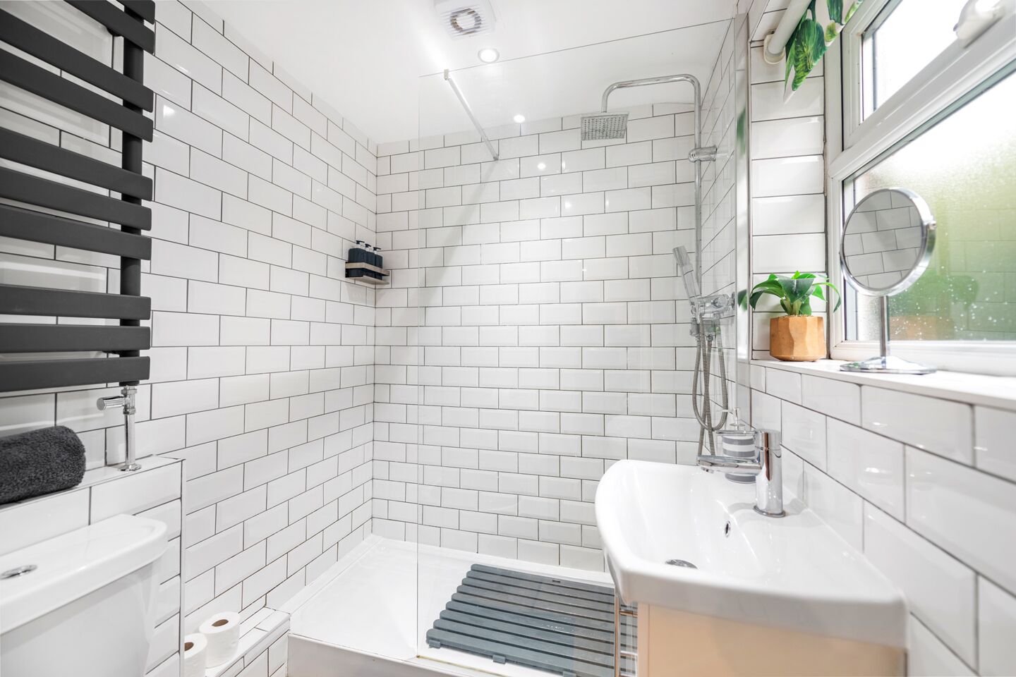 Shower, hair dryer, towels, toilet paper