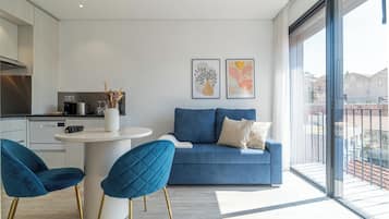 Apartamento, 1 quarto, sacada | Área de estar