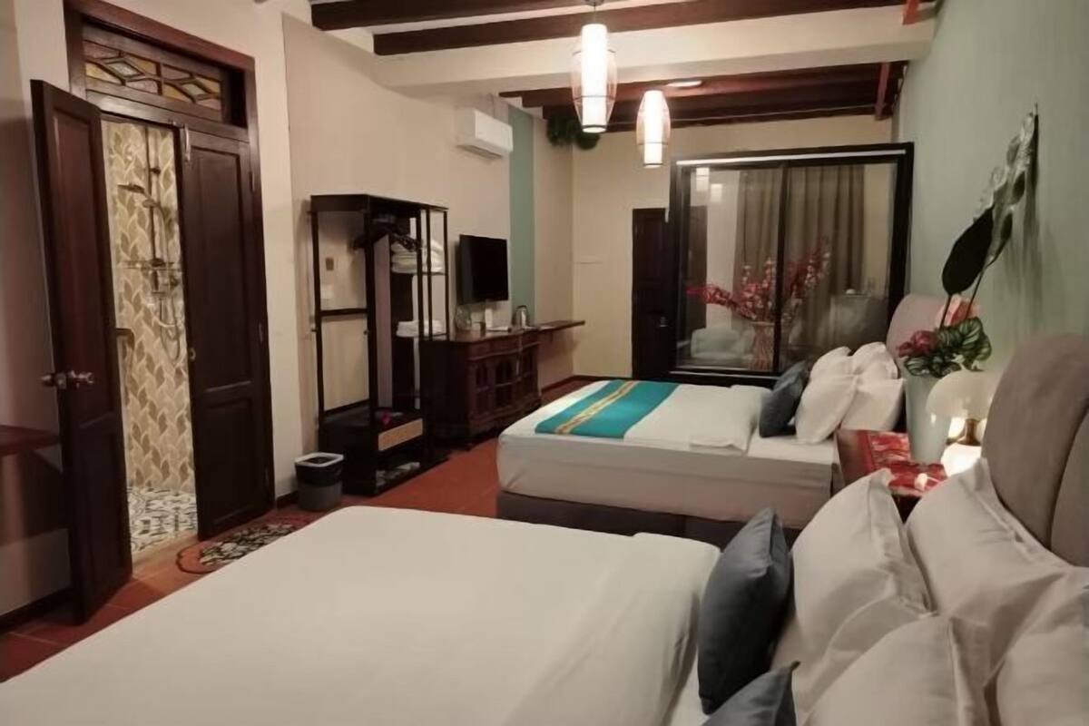 2 bedrooms, blackout drapes, soundproofing, iron/ironing board