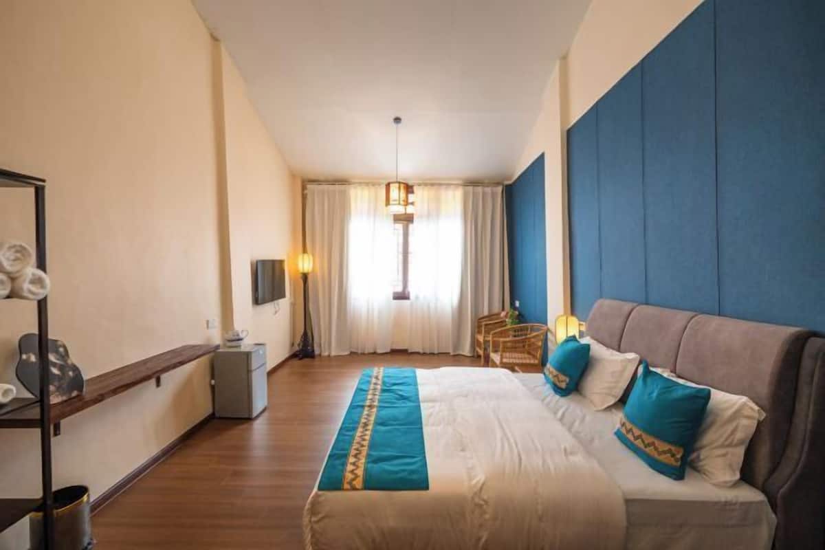 2 bedrooms, blackout drapes, soundproofing, iron/ironing board